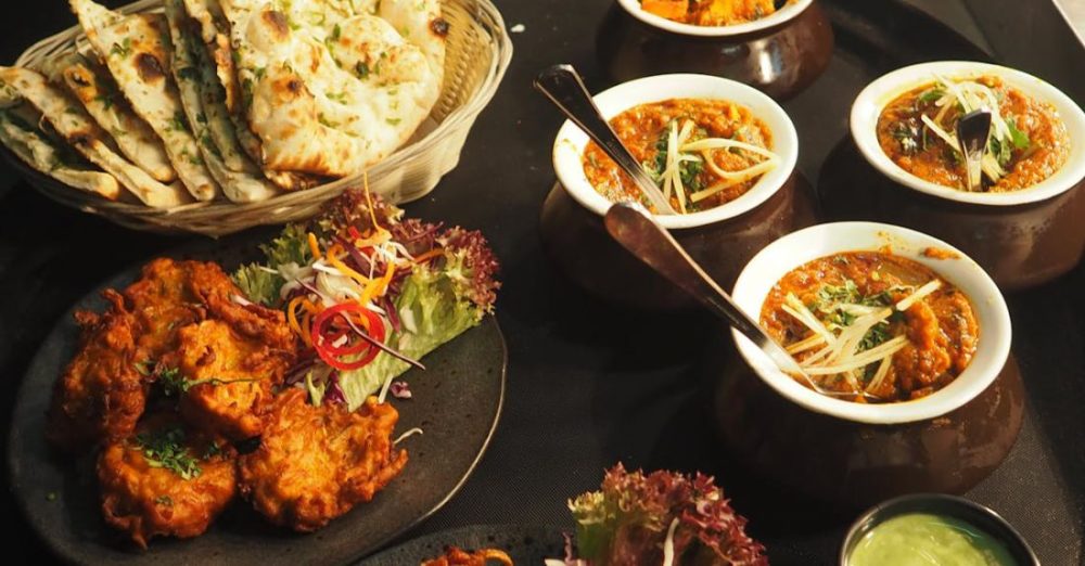 Restaurants - White and Brown Cooked Dish on White Ceramic Bowls