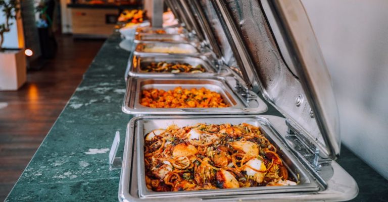 Catering - Assorted Cooked Foods Inside Food Warmers