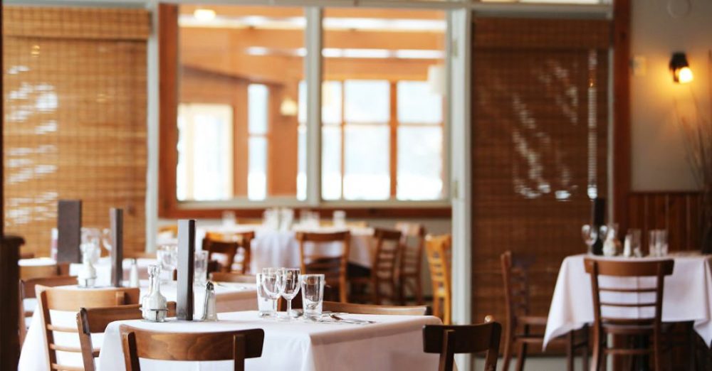 Restaurants - Clear Wine Glass on Table