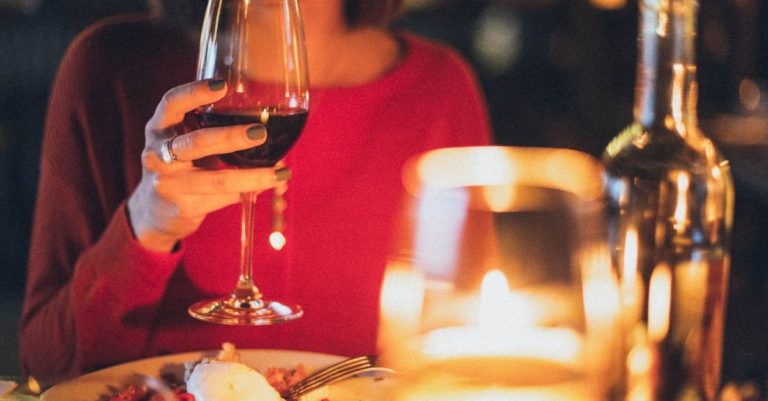 Dining - Woman Holding Wine Glass Selective Focus Photography