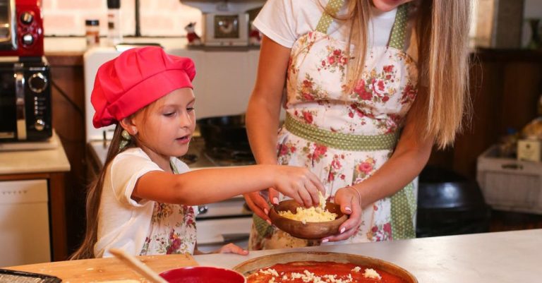 Cooking Classes - Mother and Daughter Cooking in the Kitchen